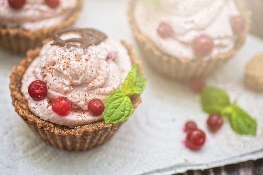 Homemade dessert from cottage cheese cream biscuit and berries