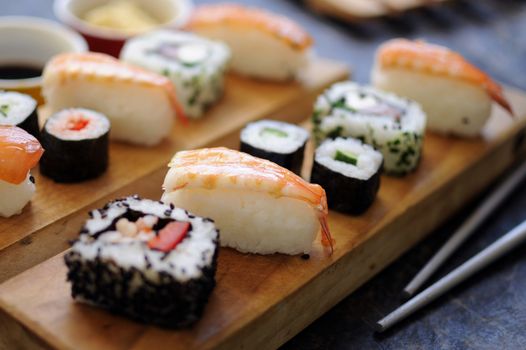 Sushi selection including prawns, salmon and vegetables with rice 