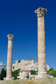 Olympeion, Ancient Temple of Olympian Zeus. Athens Greece. Acropolis at background.