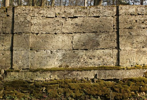 The texture of the stones in the blank stone wall that separates the park Sylvia in the Gatchina park.
