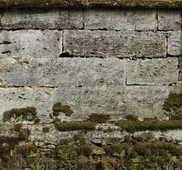 The texture of the stones in the blank stone wall that separates the park Sylvia in the Gatchina park.