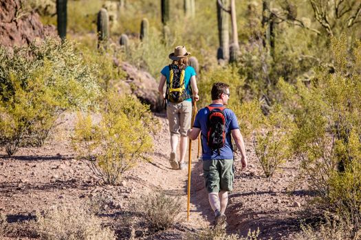 Couple rugged desert hiking in the American Southwest