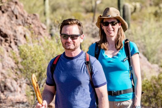 Couple desert hiking in the American Southwest