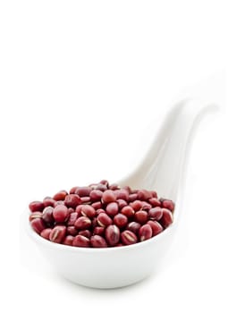 azuki beans , red beans in white spoon isolated on white background.