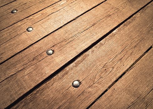 abstract background or texture wood board with rivets