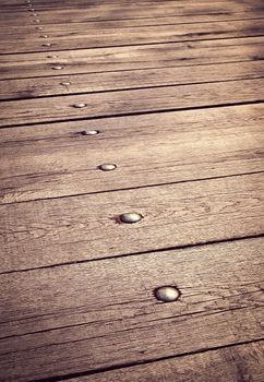 abstract background or texture wood board with rivets