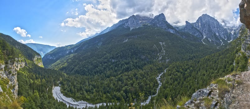 Landscape on the Dolomiti of Brenta Group in a beautiful summer afternoon with clouds over the top, Trentino - Italy