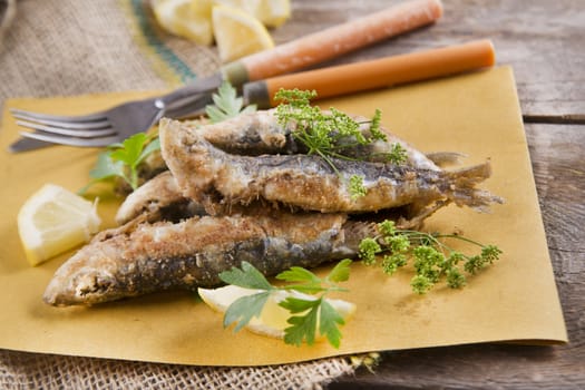 Presentation of a seafood platter, fried anchovies 