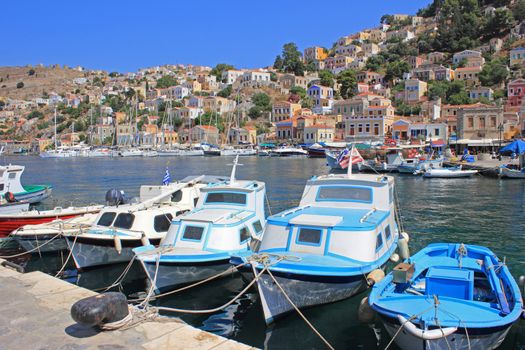 Fishing boats at the harbour of Symi. Dodecanese, Greece, Europe
