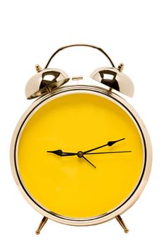 Bright yellow covered face on this retro alarm clock.  Lots of copy space