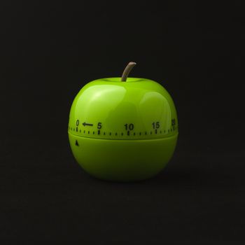 kitchen timer in the form of green apple