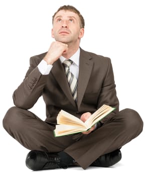 Man sitting with book and thinking isolated on white background