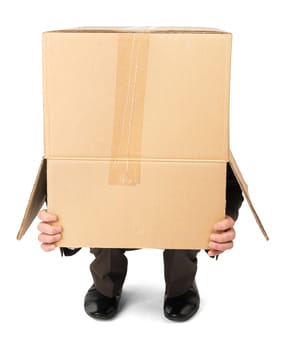 Businessman hiding behind box isolated on white background