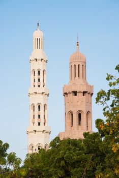 Two minarets at Sultan Qaboos Grand Mosque in Muscat, the main mosque of The Sultanate of Oman.