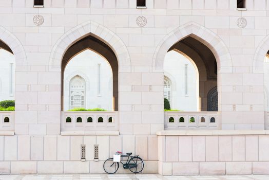 Bicycle parked outside Sultan Qaboos Grand Mosque in Muscat, the main mosque of The Sultanate of Oman.