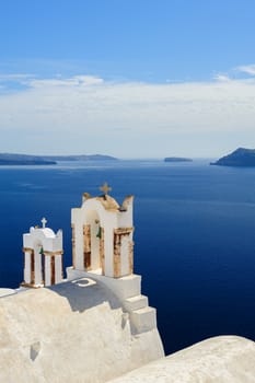 Blue and white orthodox church bell tower. Oia, Santorini Greece. Copyspace