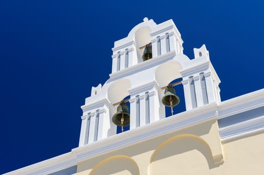 Blue and white orthodox church bell tower. Oia, Santorini Greece. Copyspace