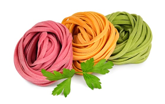 Italian colored fresh rolled fettuccine pasta with parsley isolated on white background.