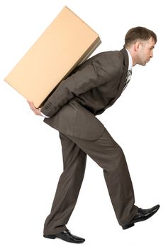 Young man in suit carrying cardboard box on his back. Isolated