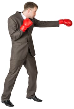 Full length portrait businessman boxing isolated on white background