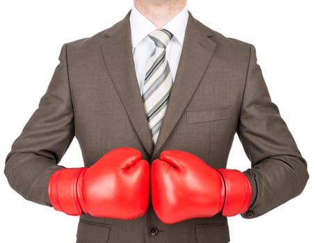 Businessman in boxing gloves isolated on white background