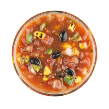 Bowl of grilled corn and black bean salsa isolated on white and viewed from above.