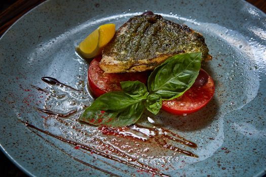 Fish dish. The fried fish and vegetables