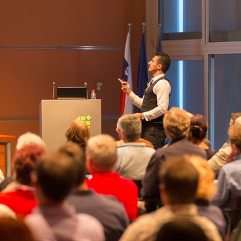 Speaker at Business Conference and Presentation. Audience at the conference hall. Business and Entrepreneurship.