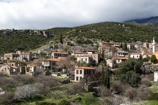General view of historical Doganbeyli village in Aydin city in Turkey wit great landscape on cloudy sky background.