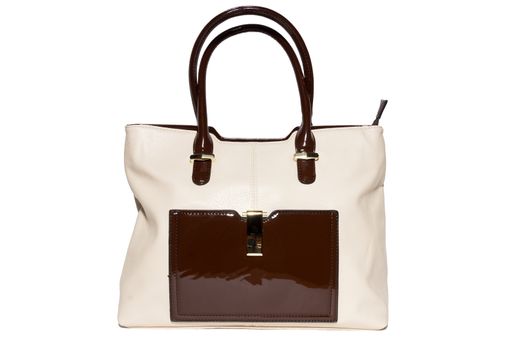 The photograph shows a female handbag on a white background