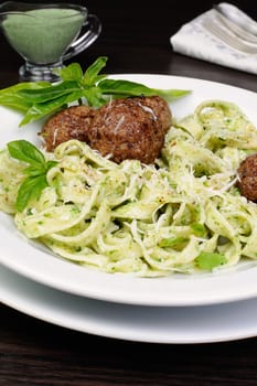 Meatballs with pasta sauce avocado,  parmesan and basil