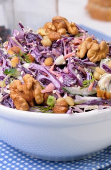 salad of shredded red cabbage with nuts in milk sauce