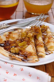 Pancakes   apple slices with caramel and chocolate