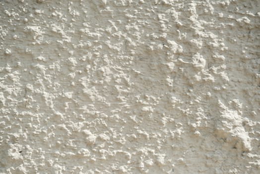 Aged cement stucco rough wall texture. Hard light