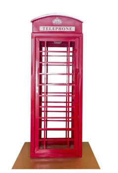 Classic British red phone booth isolated on white background