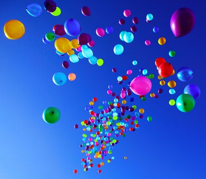 colorful balloons on a blue sky background