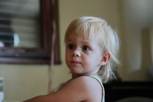 Portrait of cute young  girl with blond  hair
