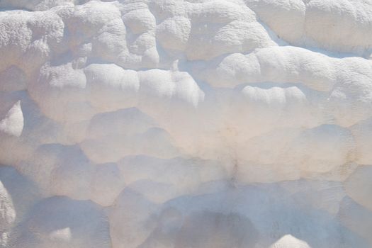 Pammukale, Turkey - July, 2015: closeup of travertines in Pammukale near modern turkey city Denizli