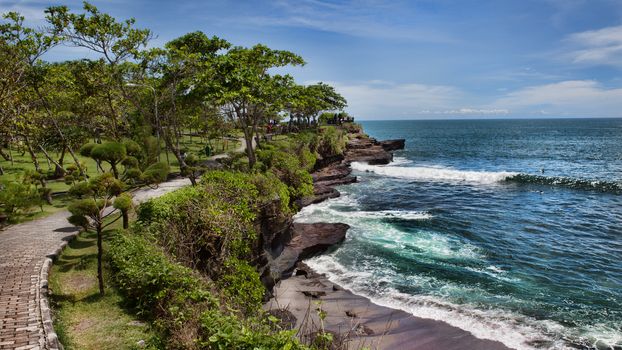 Coast at Uluwatu temple, Bali, Indonesia. The path by the ocean