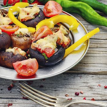 Mushrooms stuffed with cheese,tomatoes and green peppers