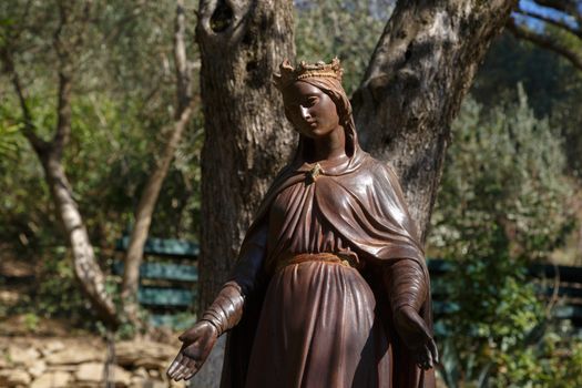 Front view of brown iron Virgin Mary Sculpture in Ephesus, Selcuk, Izmir, Turkey.