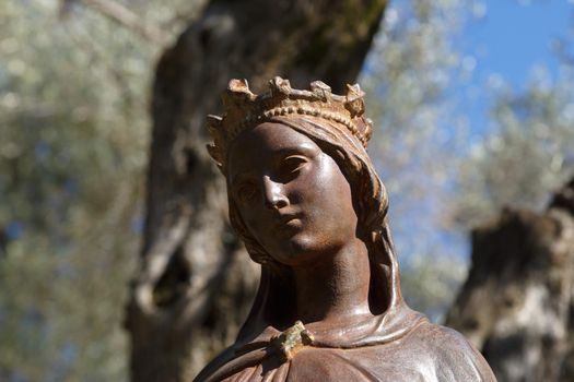 Front view of brown iron Virgin Mary Sculpture in Ephesus, Selcuk, Izmir, Turkey.