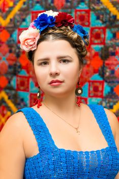 young girl in the image of Frida Kahlo