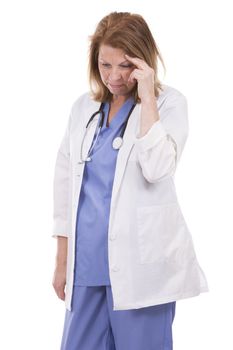 caucasian woman wearing doctor's scrubs on white background