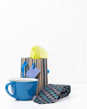 A cup of coffee and a new tie are great gifts for dad.