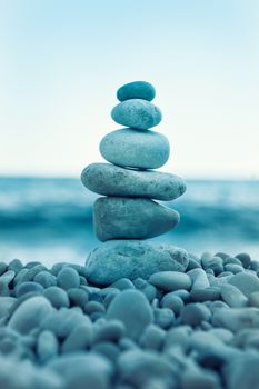 Stack of stones on the sea beach