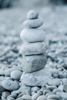 Stack of stones on the sea beach