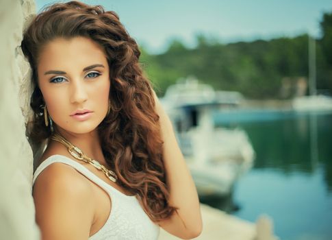 luxury potrait beautiful girl, gold jewel, curly hair