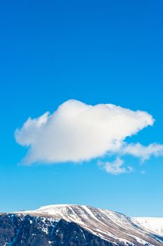 Sky over a mountain top with blue heaven