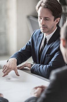 Group of business people working together at meeting in office